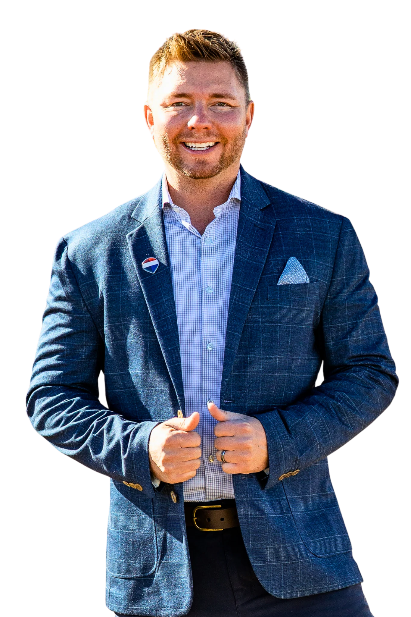 Dane Rickard smiling in a blue blazer