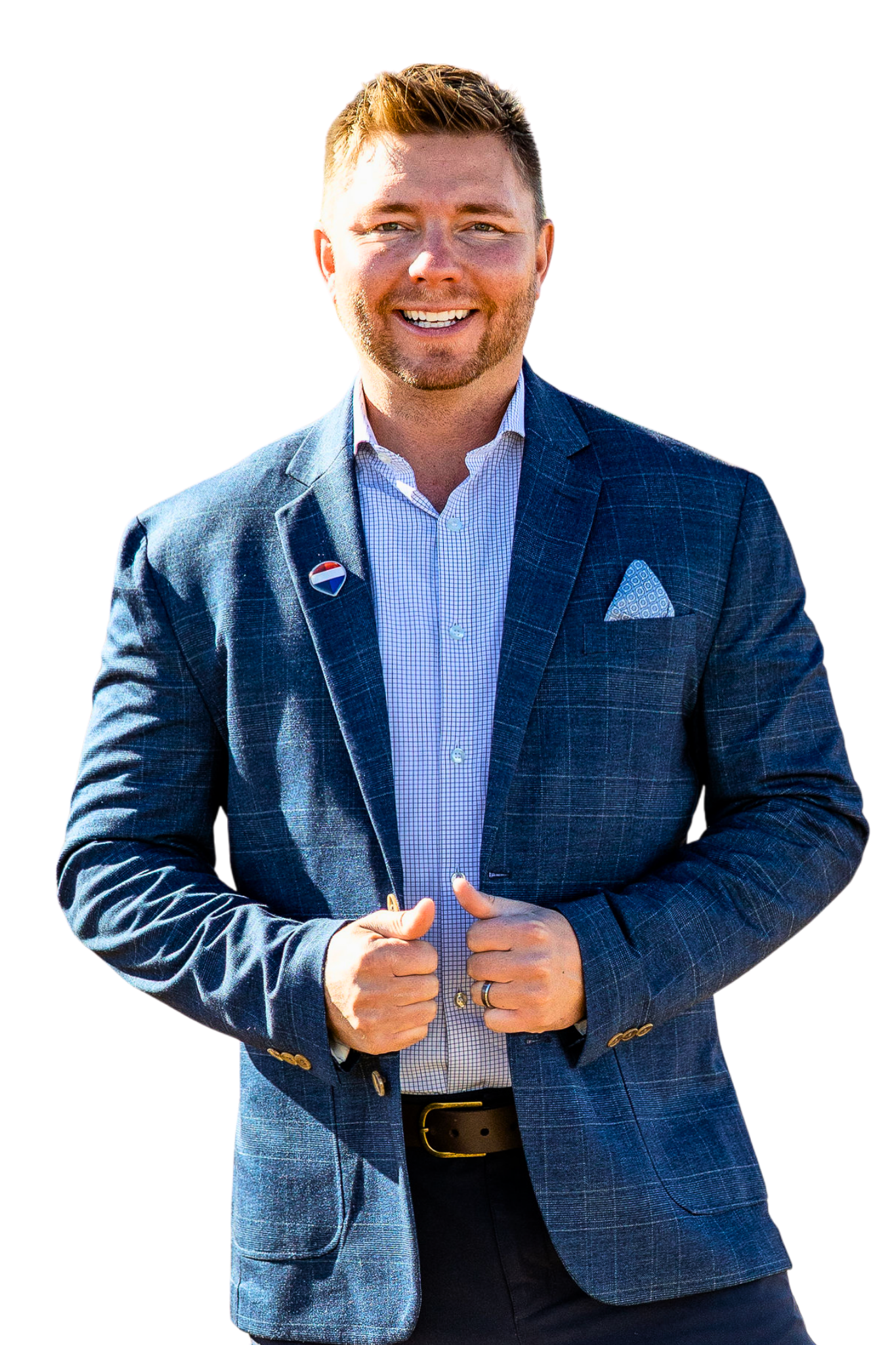 Dane Rickard smiling in a blue blazer
